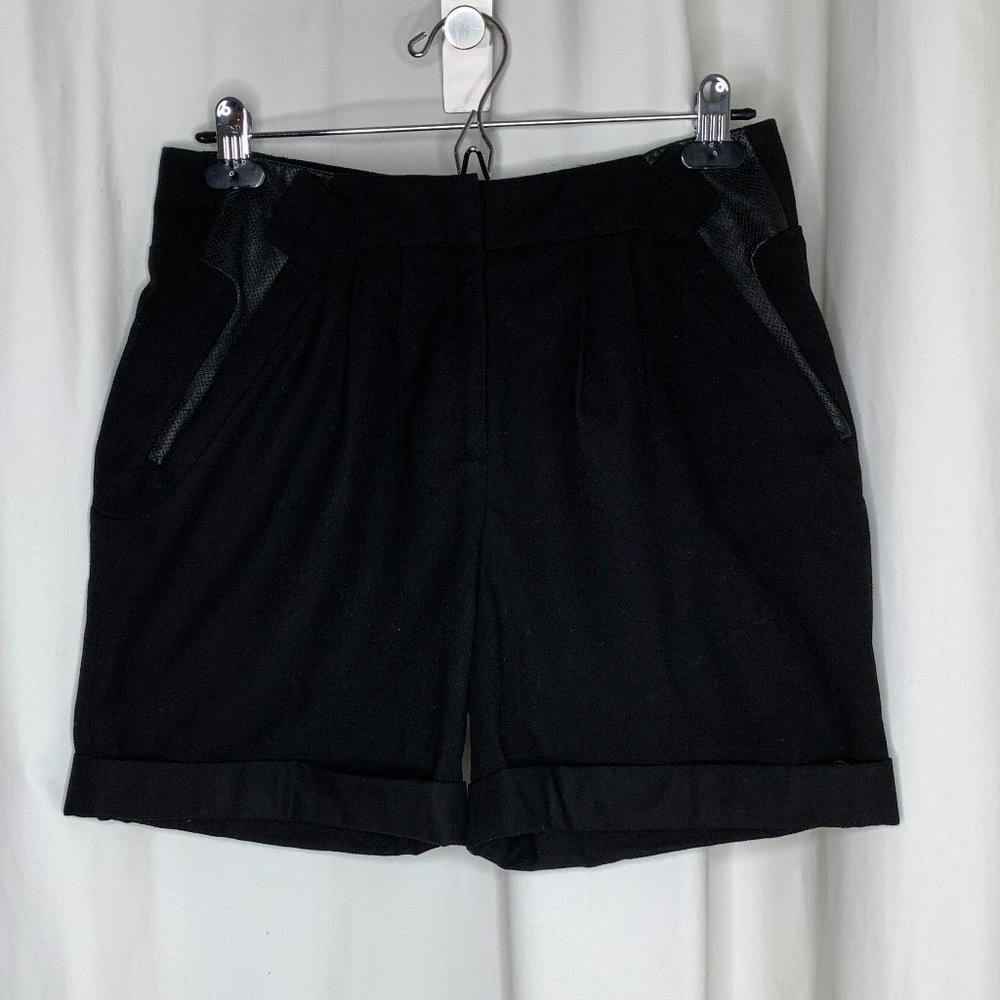 Shorts with leather panels